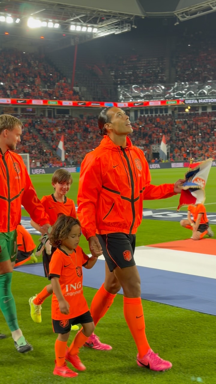 Virgil van Dijk, leading the team out together with his son for his 100th cap. 🥹🧡